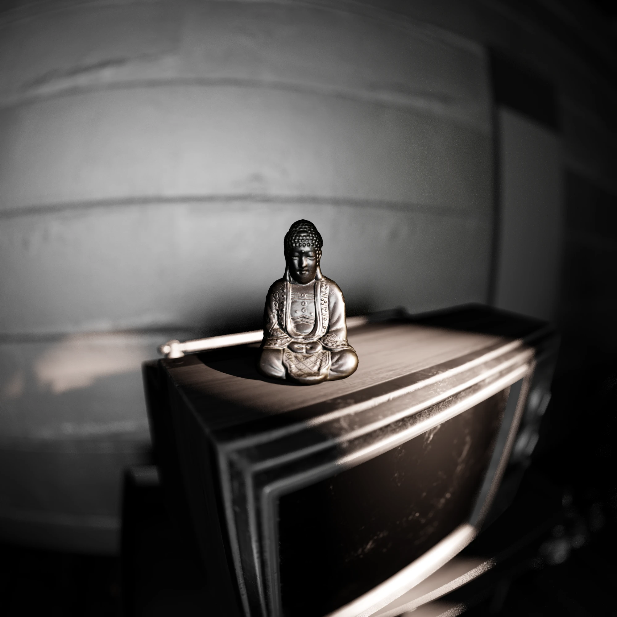 A black-and-white version of the frame, with warm light kept on the figure and the wall