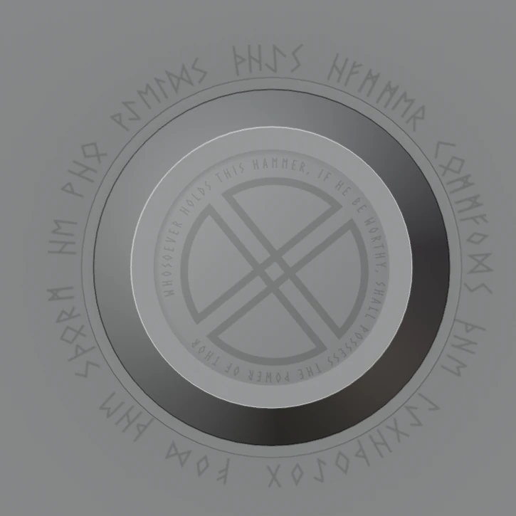 Clay view from above: the pommel’s cross and inscription inside a ring of runes