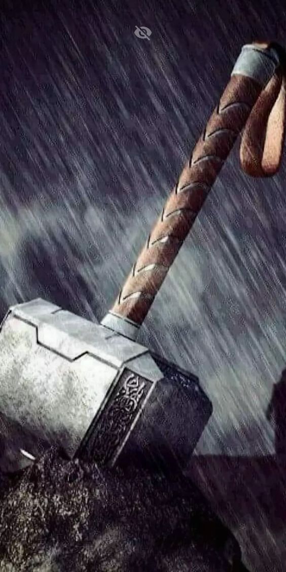 Mjölnir lying in heavy rain, its handle wrapped in leather