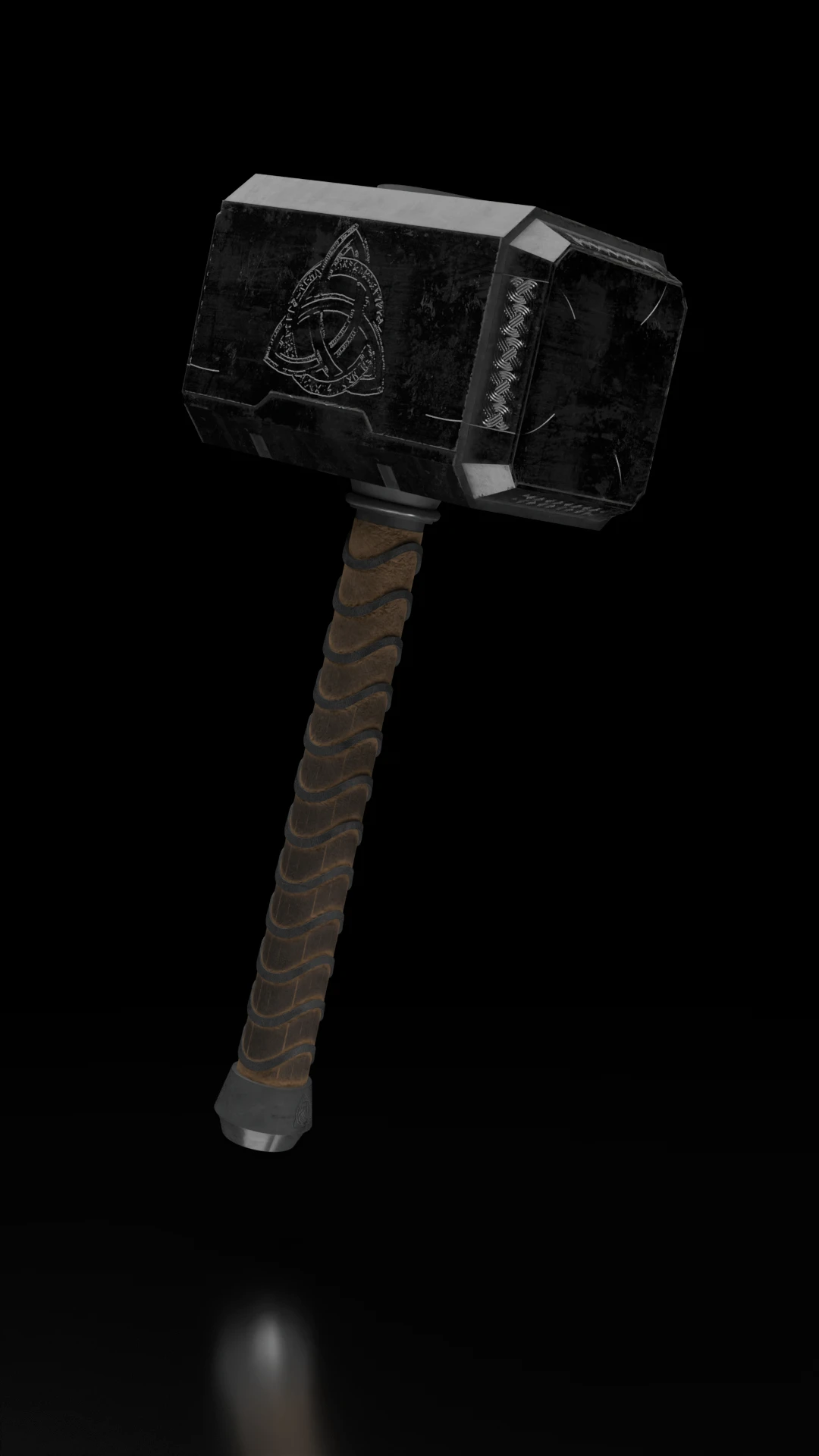 The whole hammer on black: a worn metal head and a leather-wrapped handle